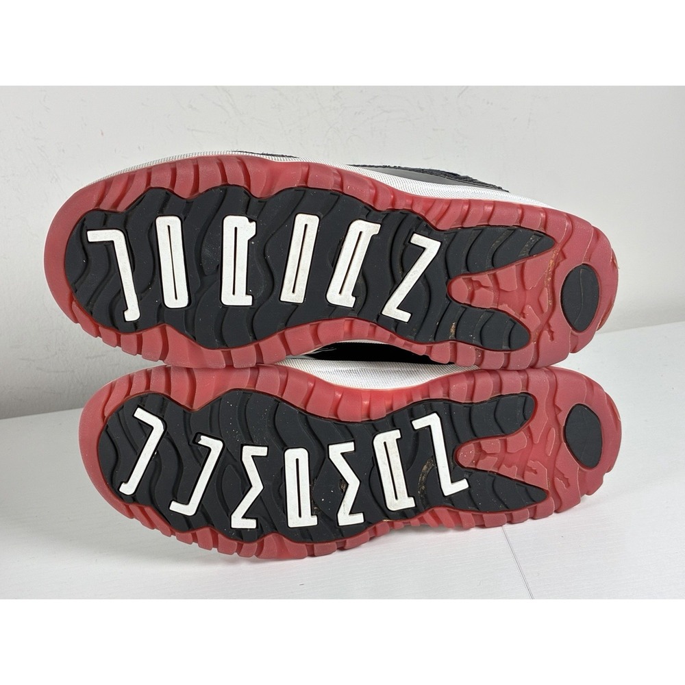 Air Jordan 11 Retro Low "Bred" 2Y Youth Basketball Shoes - Picture 8 of 9